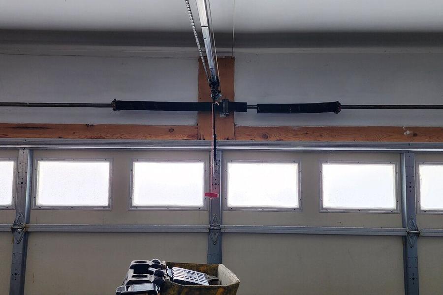 DPS Garage Doors newly installed dual torsion springs on a garage door in the GTA